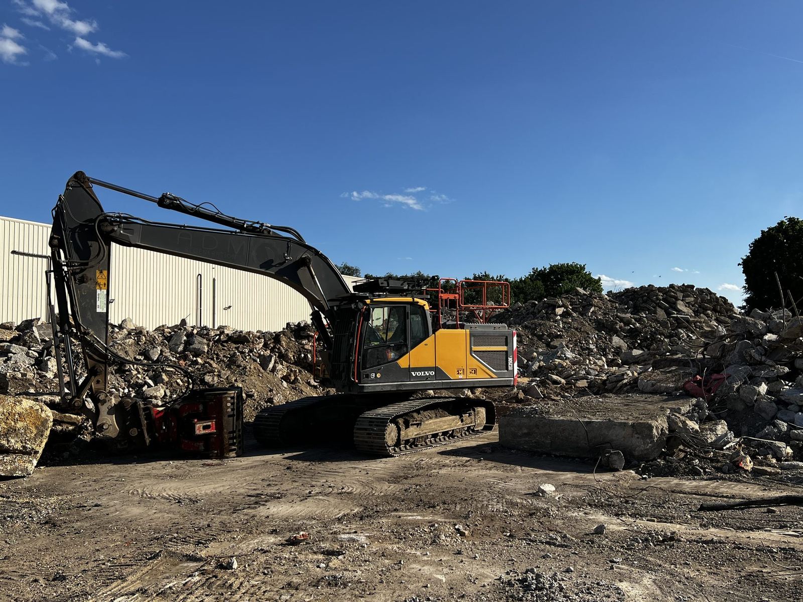 Surface Demolition Volvo excavator on site